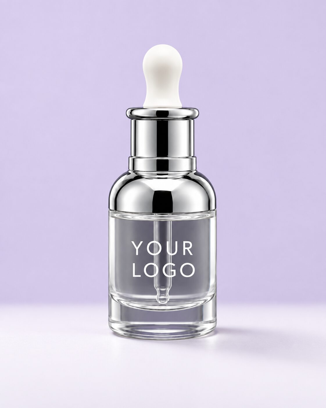 Transparent cuticle oil in a silver-capped dropper bottle