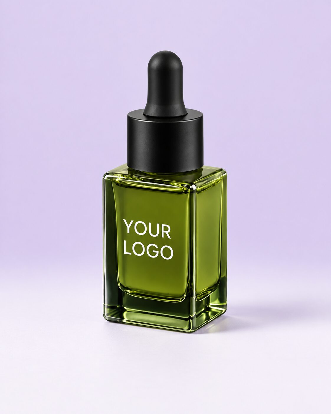 Colored cuticle oil in a square dropper bottle